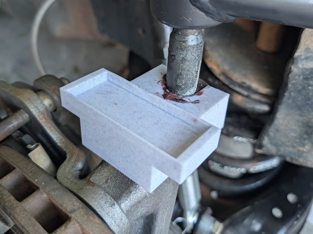 Caster fixture seated in the pocket on top of a Speedway three-piece spindle